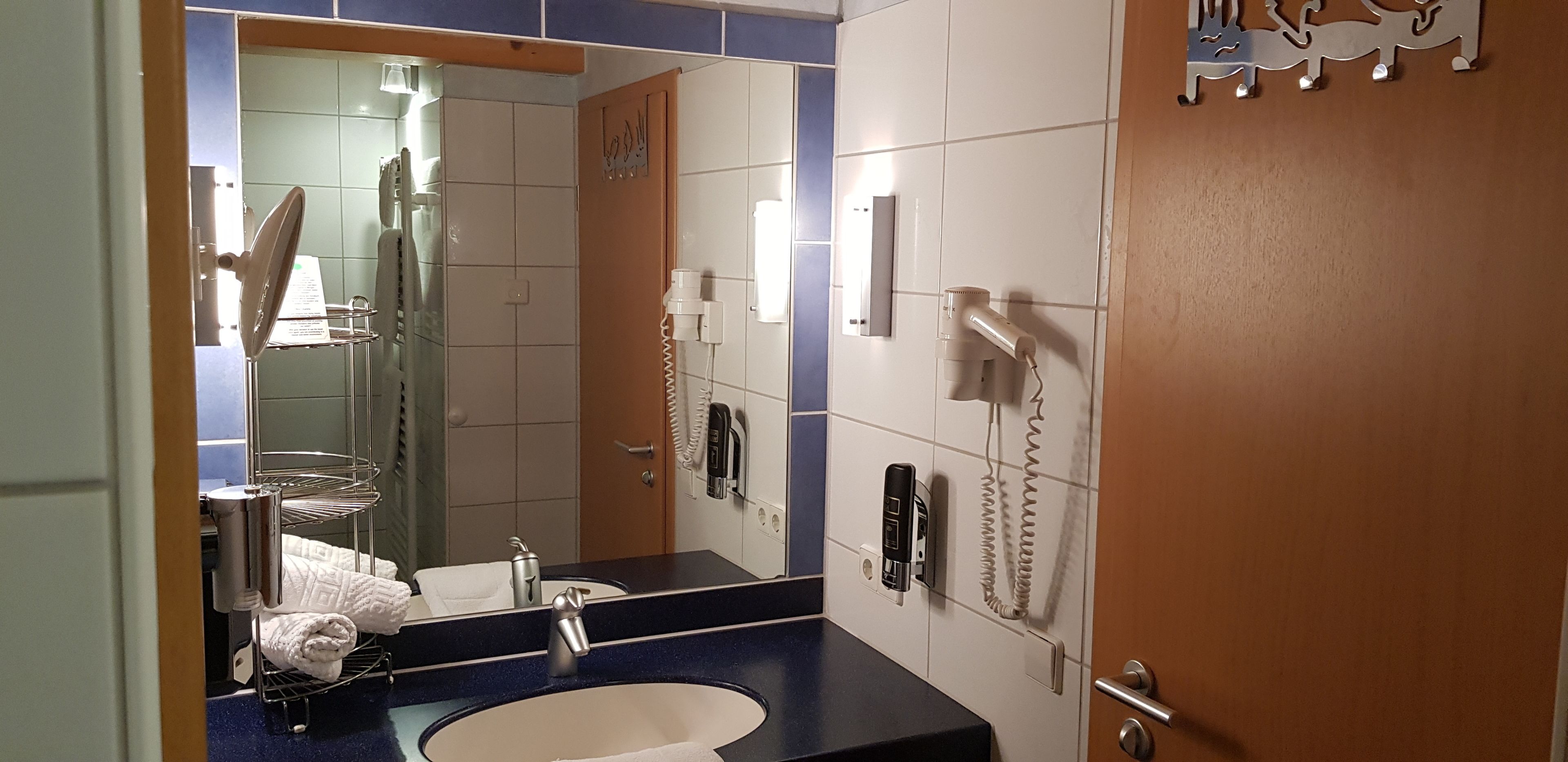 shower, free toiletries, hair dryer, towels