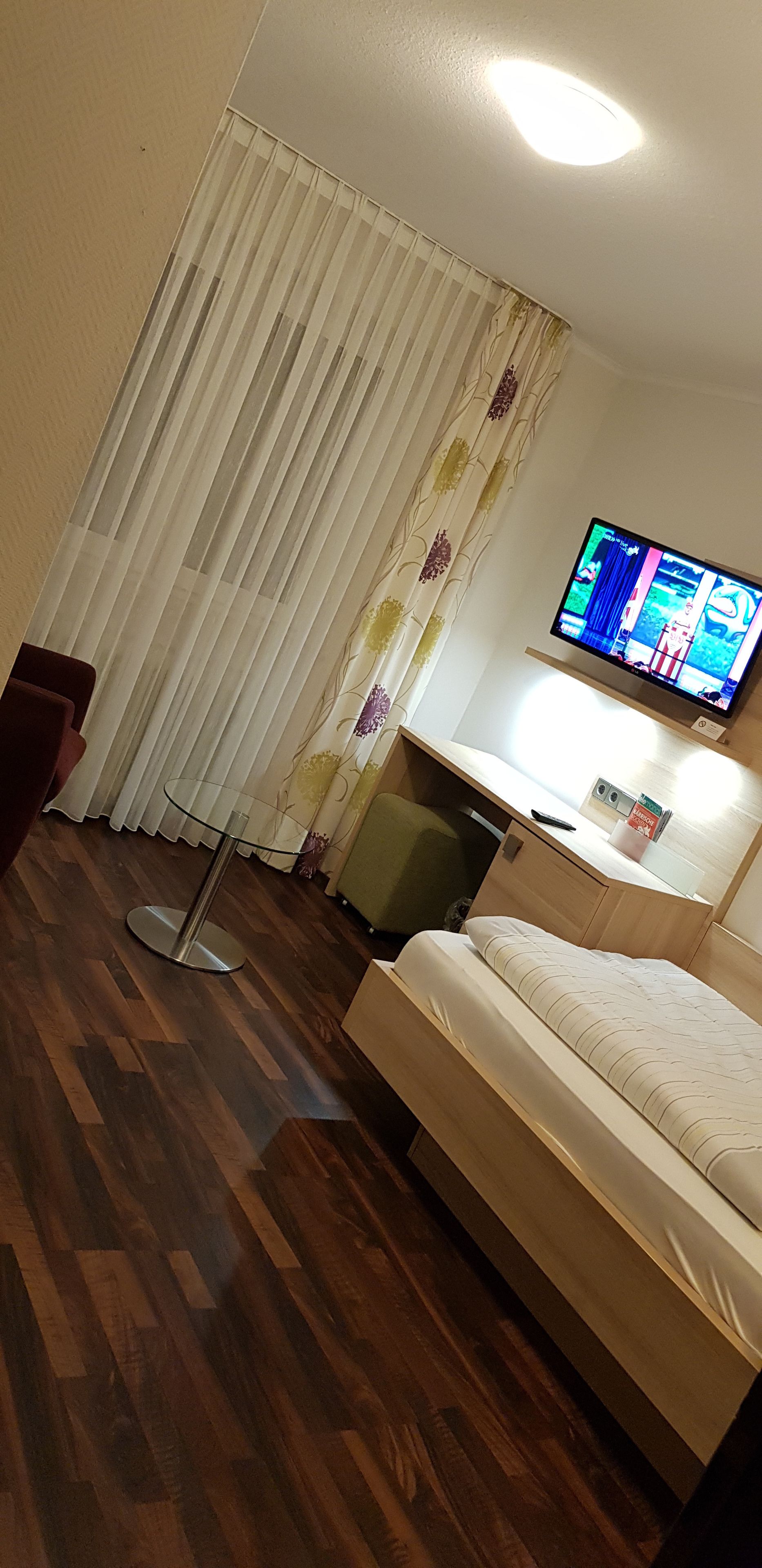 comfort single room | in-room safe, desk, blackout curtains, iron/ironing board