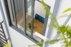 Chambre Triple Deluxe, 1 chambre | Balcon