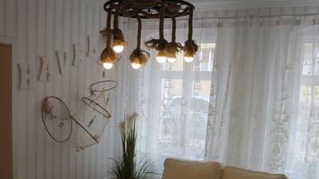 Comfort Condo, 1 Bedroom, City View, Ground Floor | Living area | Flat-screen TV