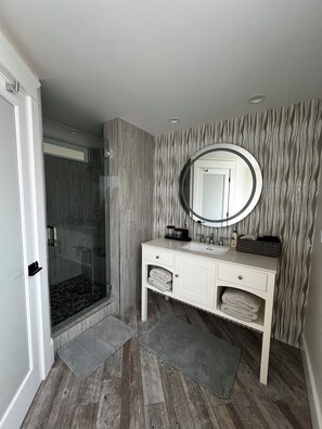 Combined shower/tub, hair dryer, towels, soap
