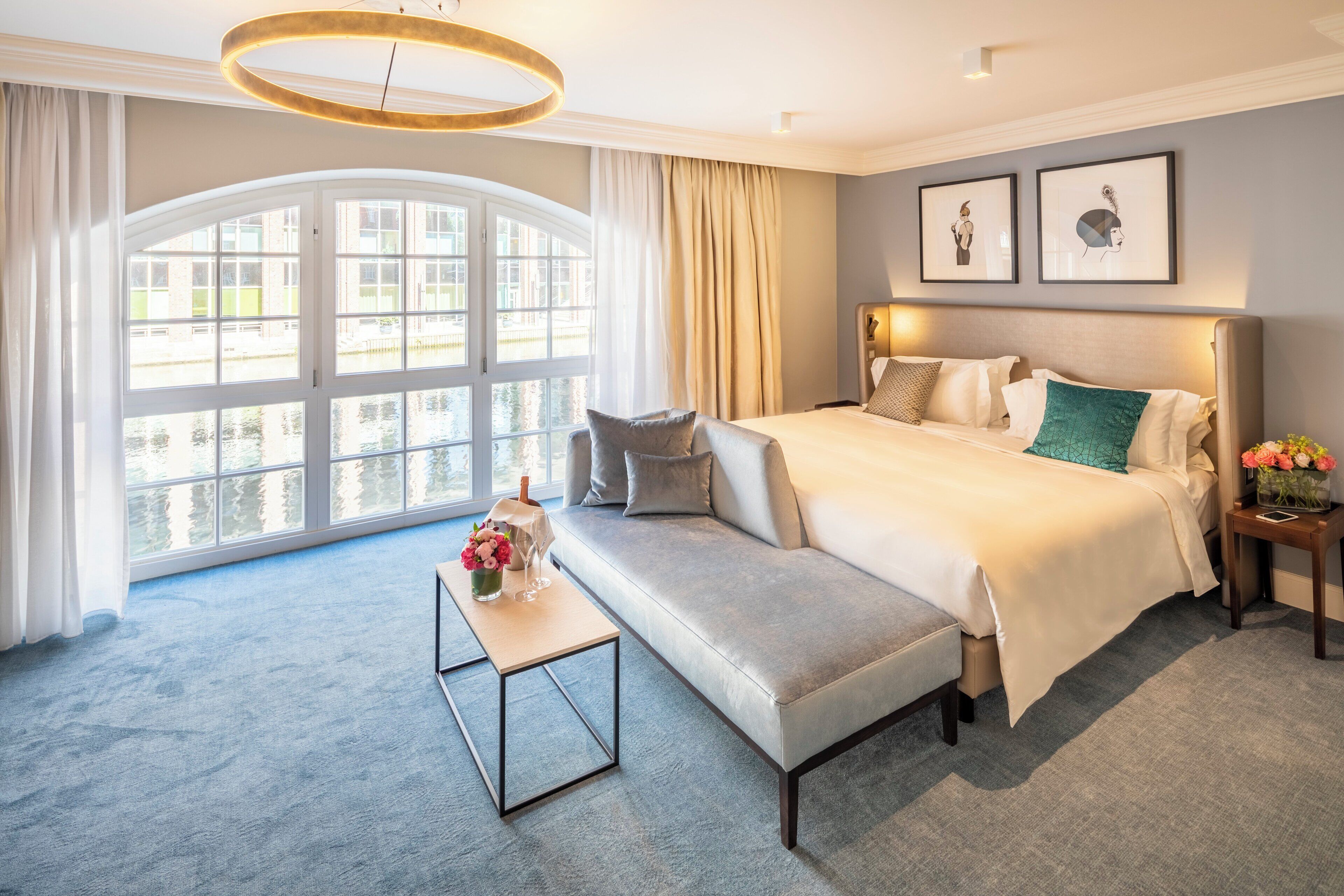 egyptian cotton sheets, down duvets, free minibar items, in-room safe