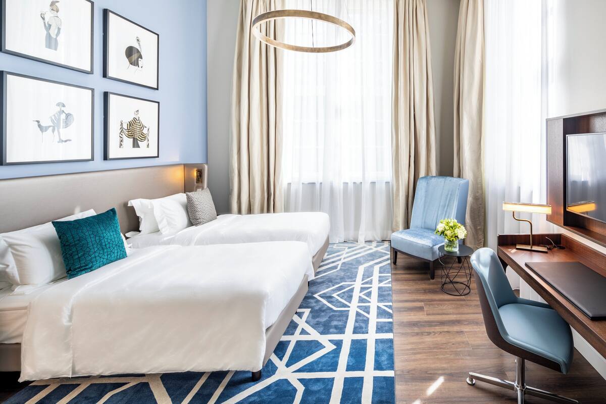 Egyptian cotton sheets, down duvets, free minibar items, in-room safe