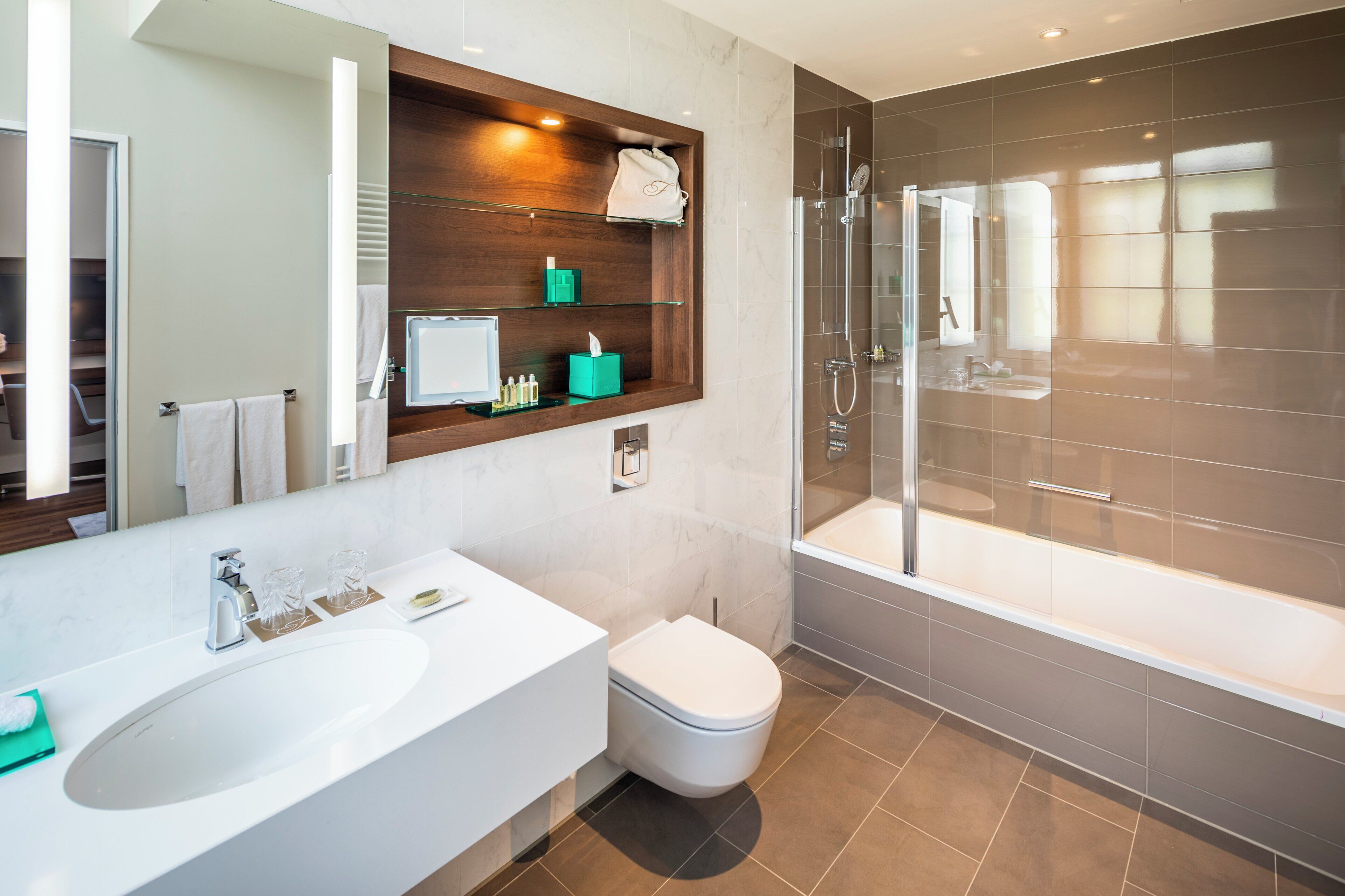 eco-friendly toiletries, hair dryer, bathrobes, slippers