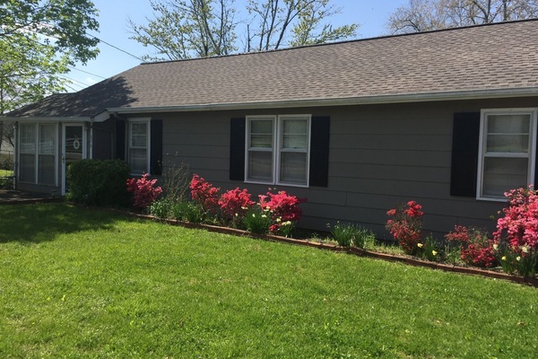 Front of the home in spring bloom.