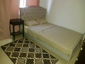 Family Apartment, 3 Bedrooms, Kitchen, Pool View | Blackout curtains, iron/ironing board, free WiFi, bed sheets - Relax waterfront serviced apartment (Serrekunda)