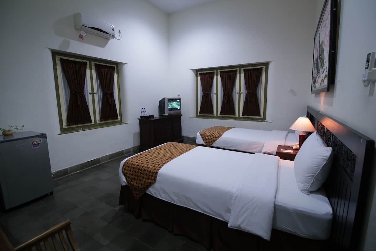 Kamar Deluks | Tempat tidur lipat/tambahan, Wi-Fi gratis, dan seprai linen