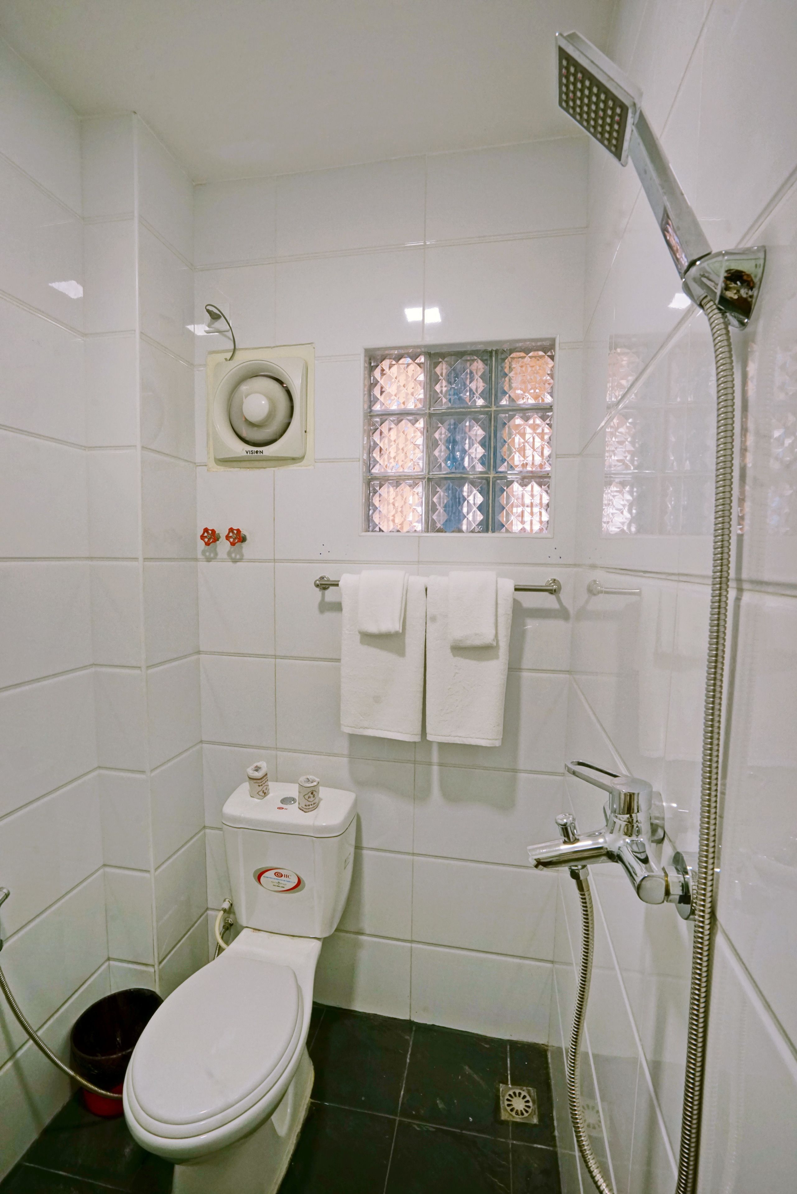 superior twin room | bathroom | free toiletries, hair dryer, slippers, towels