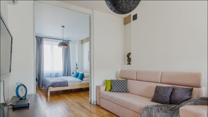 Classic Apartment | Living area | Flat-screen TV - P&O Apartments Chmielna 1 (Warsaw)