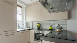 Classic Apartment | Private kitchenette | Coffee/tea maker, fridge, oven, stovetop - P&O Apartments Chmielna 1 (Warsaw)