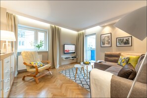 Economy Apartment | Living area | Flat-screen TV - P&O Apartments Chmielna 2 (Warsaw)