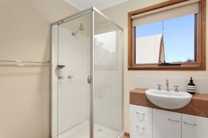 Shower, free toiletries, hair dryer