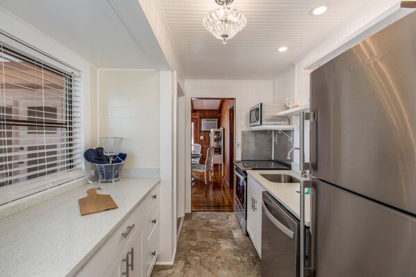 Fridge, microwave, oven, stovetop - Charming 2BR WATERFRONT home in Indian Rocks Beach, perfect for a coastal getaway! (Indian Rocks Beach)