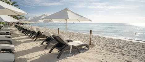 Beach nearby, white sand, beach cabanas