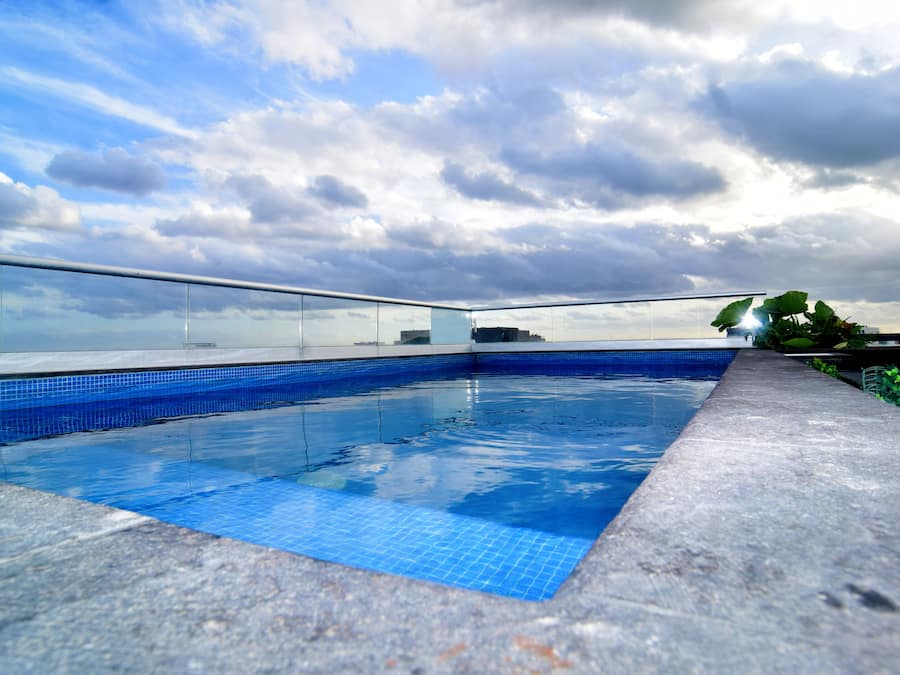 Outdoor pool, open 8:00 AM to 10:00 PM, sun loungers