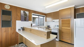 Fridge, microwave, toaster, cookware/dishes/utensils