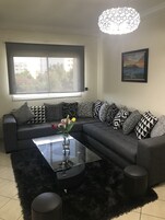 42-inch flat-screen TV with satellite channels, Smart TV