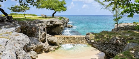 On the beach, sun loungers, beach towels