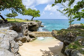 On the beach, sun loungers, beach towels