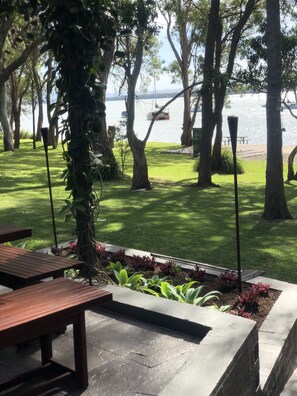 Outdoor dining - Your waterfront home away from home (EV & Pet Friendly) (Chain Valley Bay)