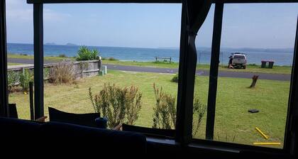 Beach Side Cabin - neat and tidy with Uninterrupted views of the Bay