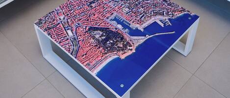 A table with a detailed city map design.