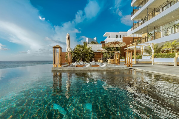 Outdoor pool, pool umbrellas, pool loungers