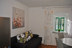 Appartement, 1 chambre | Coin séjour