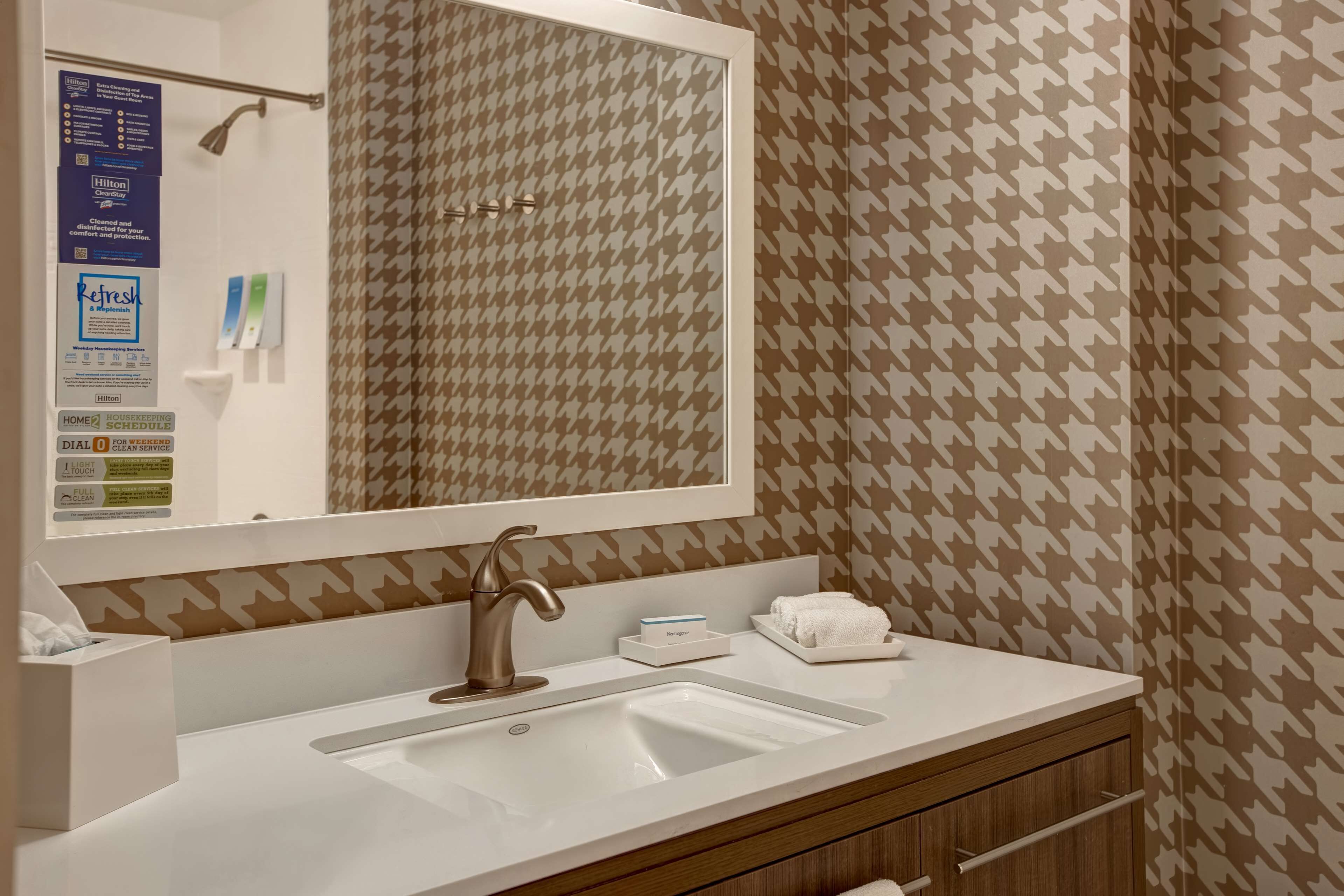 shower, designer toiletries, towels