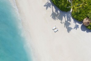 Private beach, white sand, beach cabanas, sun loungers