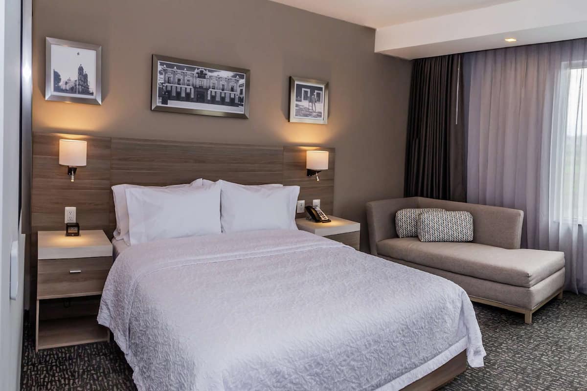 Suite, 1 Queen Bed, Refrigerator & Microwave | Premium bedding, minibar, in-room safe, individually decorated