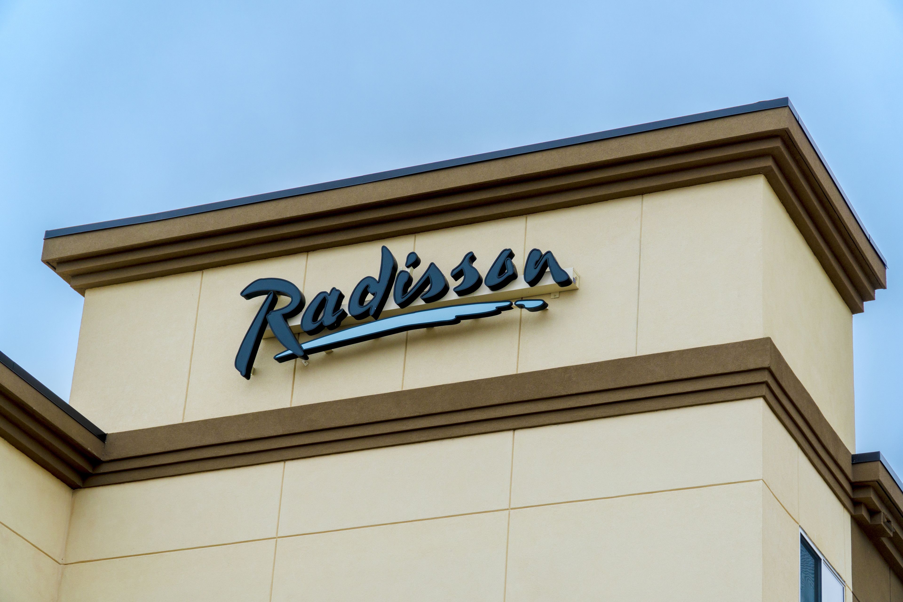 A building with the name 'Radisson' prominently displayed on the facade.