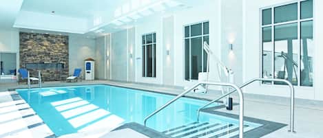 Indoor pool, open 8:00 AM to 10:00 PM, pool loungers