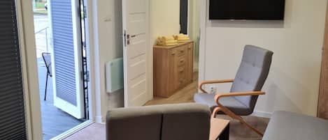 Appartement classique, salle de bain attenante | Bar-salon