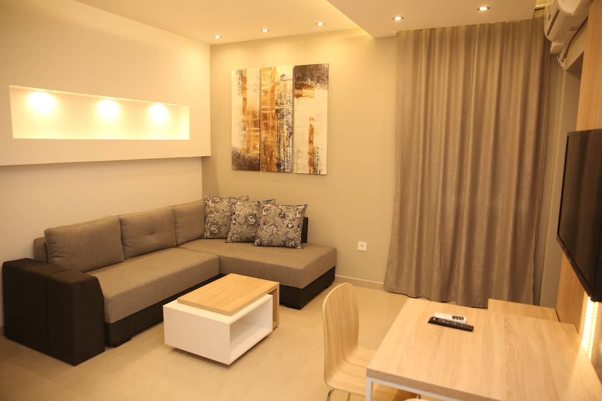 Comfort Apartment | Living room | Flat-screen TV