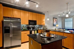 Full-size fridge - Oakwood at Mosaic South End (Charlotte)