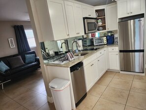 Fridge, microwave, stovetop, dishwasher - Queen 2nd Floor One Bedroom at Bayshore Inn & Docks (Naples)