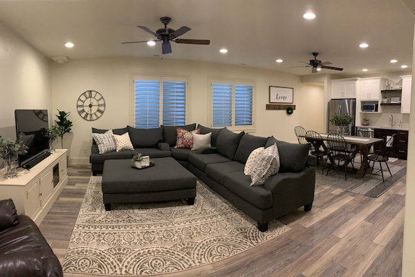 Open main living area. If needed, Queen blow-up mattress replaces ottoman.