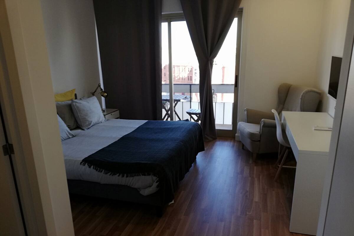 Premium Suite, 1 Queen Bed, City View | 1 bedroom, Select Comfort beds, desk, blackout drapes