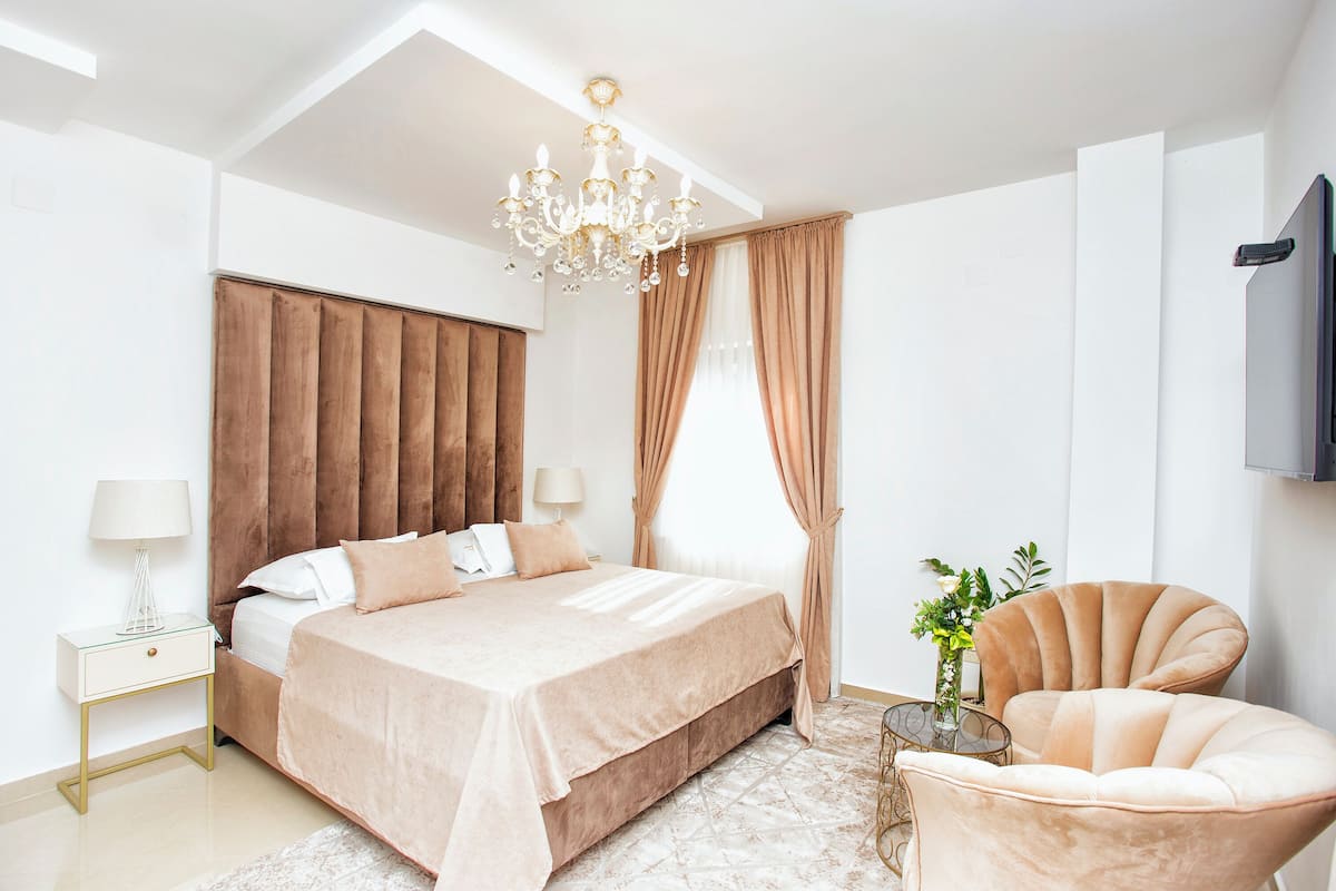 Chambre Double Deluxe, vue mer | Literie de qualité supérieure, minibar, coffres-forts dans les chambres