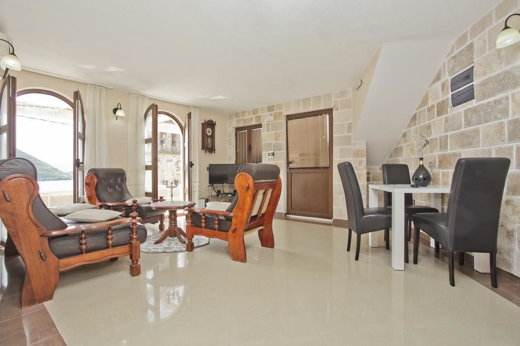 Superior Apartment, Sea View | Living area | LCD TV