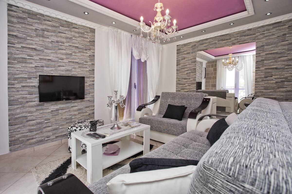 Comfort Apartment, Partial Sea View | Living area | LCD TV