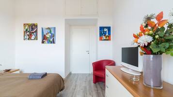 2 dormitorios, tabla de planchar con plancha, wifi