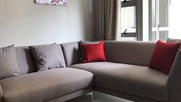 Executive Apartment | Living area | Flat-screen TV