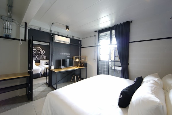 Familiekamer, privébadkamer | Luxe beddengoed, verduisterende gordijnen, gratis wifi, beddengoed