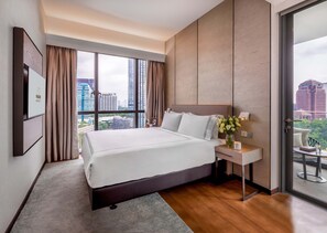 Apartamento ejecutivo, 1 habitación (One Bedroom Executive Terrace) | Caja fuerte, mobiliario individual, tabla de planchar con plancha