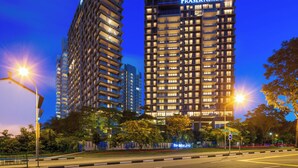 A high-rise building with the sign "Fraser Residence" at the top. - Fraser Residence Orchard, Singapore (Singapore)