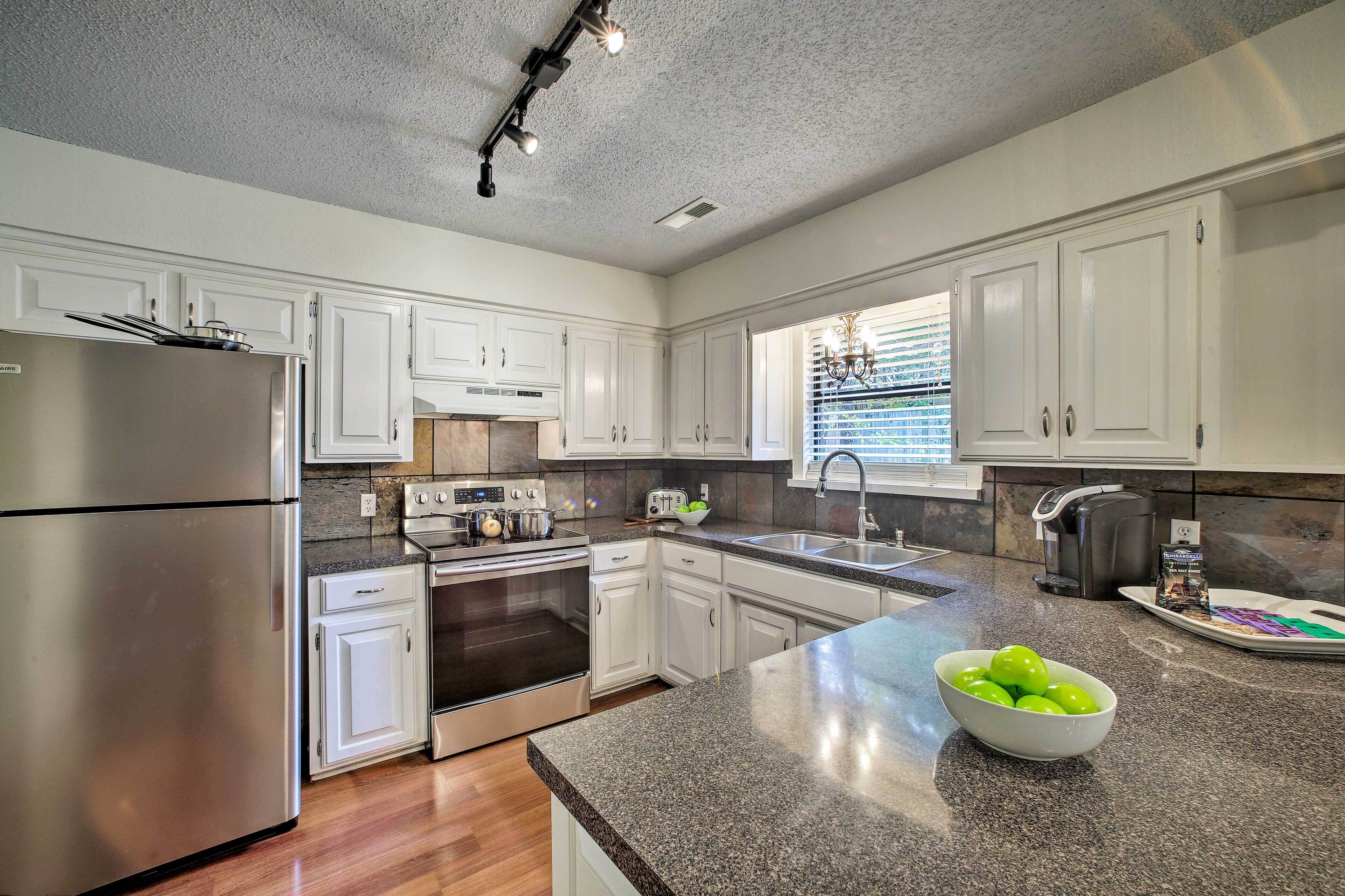Fridge, stovetop, dishwasher, coffee/tea maker