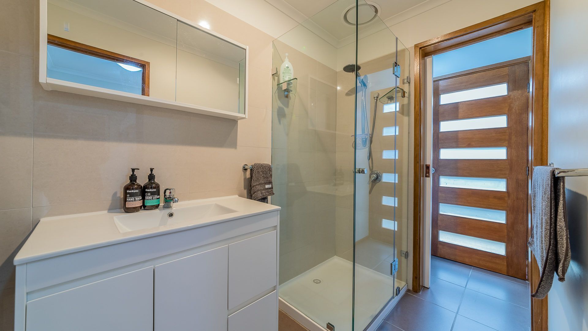 Combined shower/tub, hair dryer