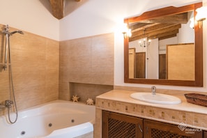 Bathtub, jetted bath, hair dryer, towels